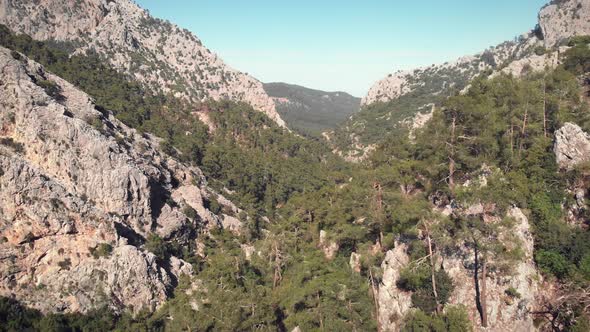 Aerial view of mountains. Flying over rocky landscape.