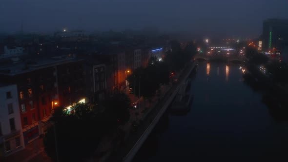 Forwards Fly Above Liffey River in Misty Evening