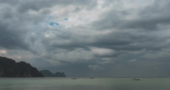 Time Lapse of Rain Clouds Over Beach and Sea Landscape with Boats. Tropical Storm in Ocean.