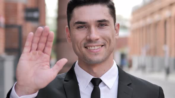 Hello, Businessman Waving Hand to Welcome Outdoor
