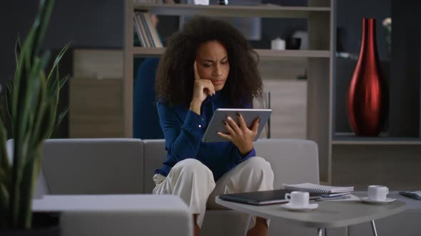 African American Woman Using Tablet Computer