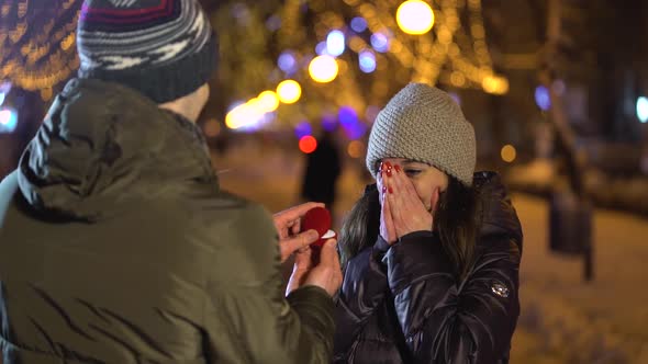 Young Man Makes an Offer of Marriage To His Girlfriend