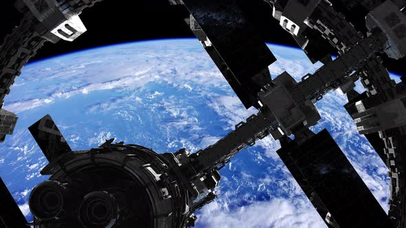 International Space Station in Outer Space Over the Planet Earth alt