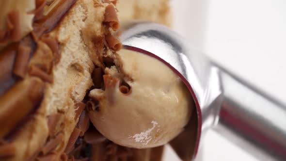 Vertical video: Chocolate ice cream in a glass