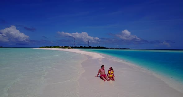 Romantic lady and man married on vacation have fun on beach on paradise white sand background 4K