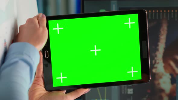 Vertical Video Close Up of Scientist Woman Holding Tablet with Green Mockup