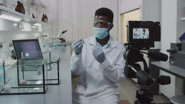 Scientist Filming Doing Research in Lab