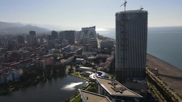 Beautiful Sunny Day in Batumi Construction of a Skyscraper with a Tall Crane