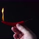 Hot red chilli pepper symbolically burns on black background - VideoHive Item for Sale