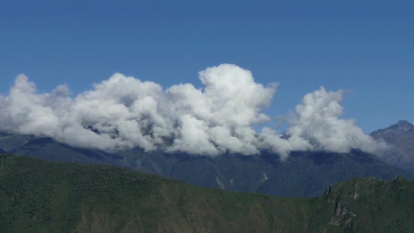 Clouds Forming In Huge Mass Over The Mountains