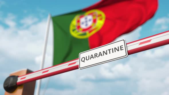 Open Boom Gate with QUARANTINE Sign Near the Portuguese Flag Background alt
