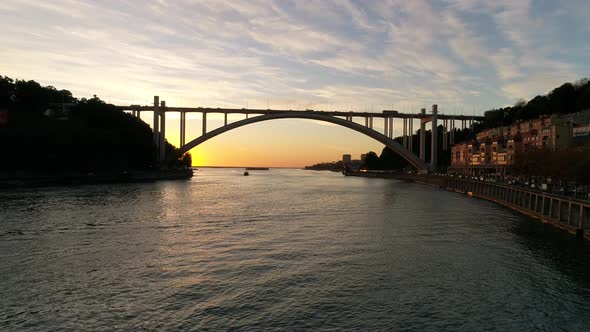 Arrábida Bridge Over River Douro at Sunset. Porto, Portugal