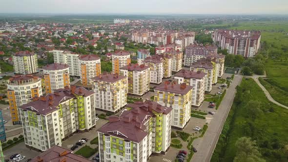 Aerial view of city residential area with high apartment buildings.