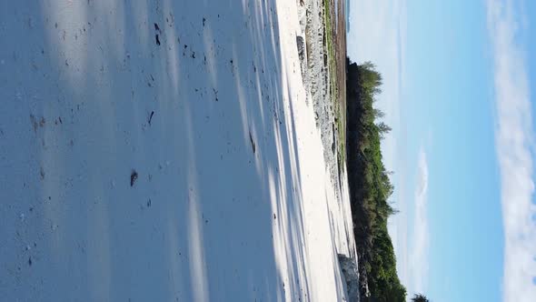 Vertical Video Empty Beach on Zanzibar Island Tanzania Aerial View