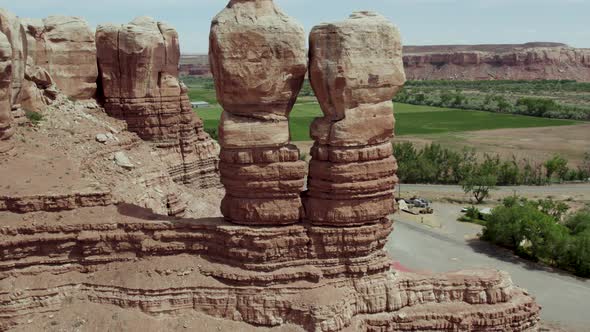 Symmetrical Pair of Rock Formation Cliffs in Utah Desert near Moab, Aerial