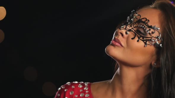 Beautiful Brunette Woman in Red Dress. Slow Motion. Close Up