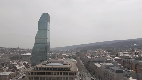 Flying over Shota Rustaveli Avenue. Skyscapers in the centre of Tbilisi