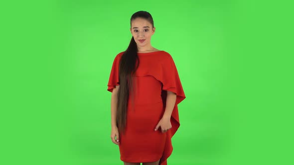 Pretty Young Woman Is Showing Thumbs Up, Gesture Like. Green Screen