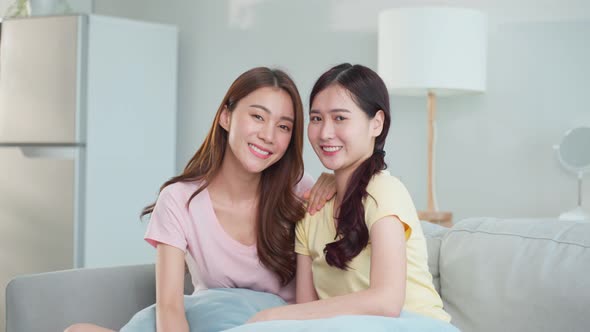 Portrait of Asian beautiful lesbian woman couple smile, look at camera. Homosexual-LGBTQ concept.