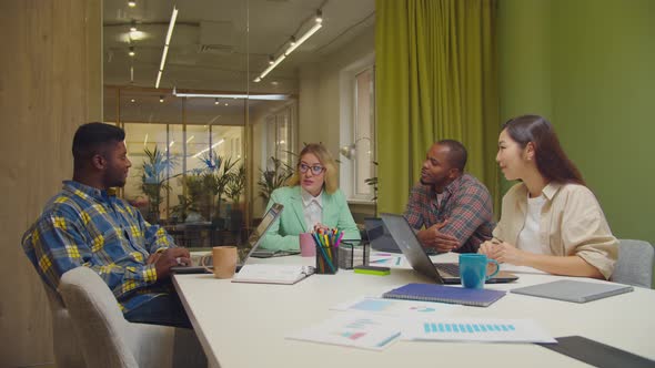 Multiethnic Business Team Meeting in Boardroom