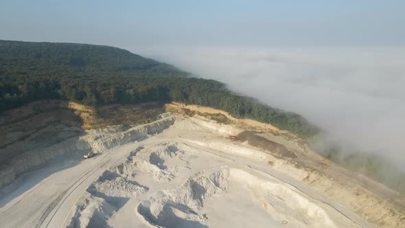 Aerial View of Open Pit Mining Site of Limestone Materials Extraction for Construction Industry with