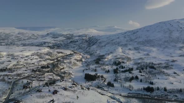 Flying Over a Norwegian Village in the Dead of Winter