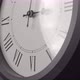 Latin Clock Face In Time Lapse On Dark Grey Wall  - VideoHive Item for Sale