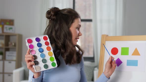 Art Teacher with Colors Having Online Class