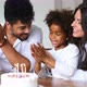 Happy Family Celebrating Birthday of Their Child - VideoHive Item for Sale