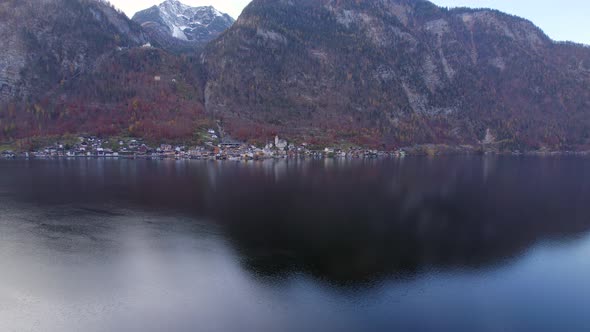 Flying Over the Lake Towards the Town of Hallstatt in Austria