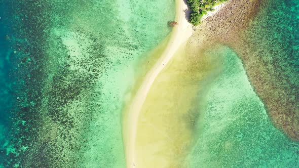Aerial flying over nature of relaxing island beach holiday by blue water and clean sand background o