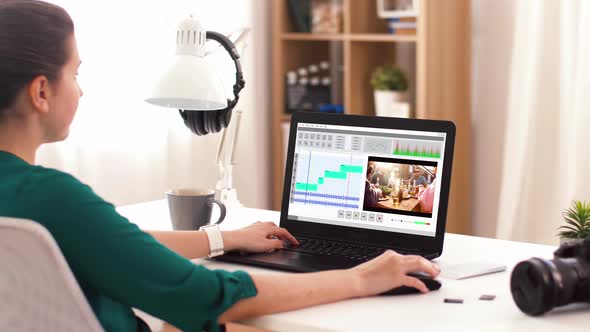 Woman with Video Editor Program on Laptop at Home