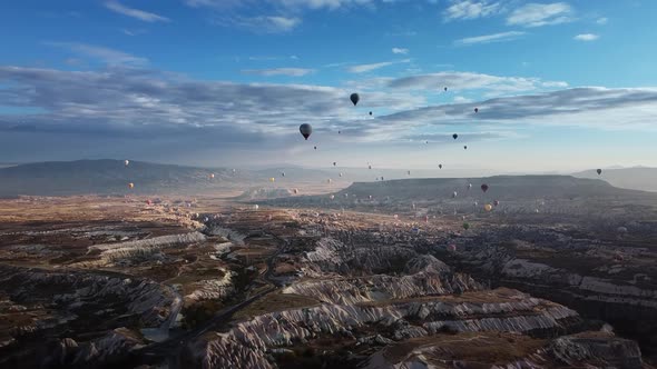 Wonderful View on Colorful Hot Air Balloons Levitating in Blue Summer Sky Over Valley