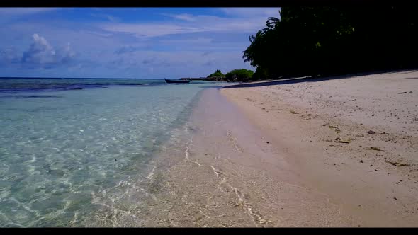 Aerial drone view tourism of perfect coastline beach vacation by blue lagoon with bright sandy backg