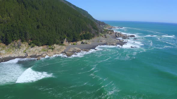 port or caleta maguellines, constitucion chile drone shot sunny day with fishing boatssurf spot