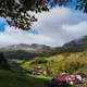 Village under mountain peaks, autumn changeable weather, arrival of rain, heavy clouds HD - VideoHive Item for Sale