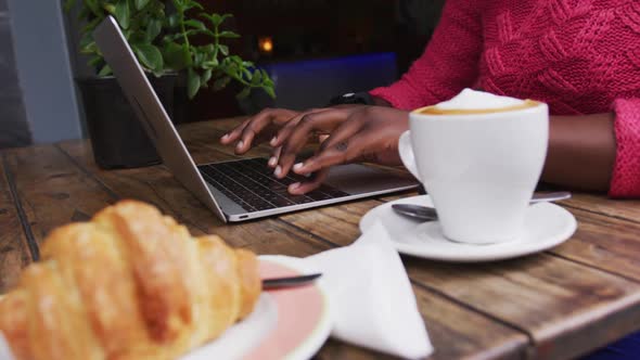 African american sitting in a cafe