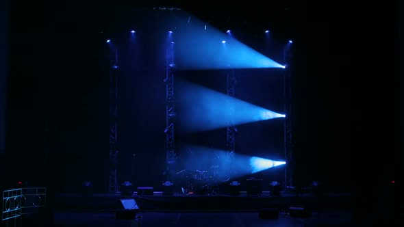 White and Blue Beautiful Rays of Light on an Empty Stage Before the Concert.