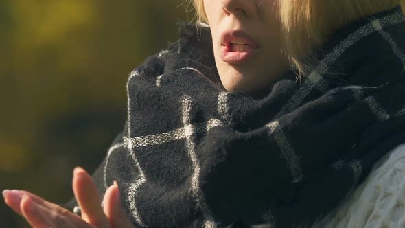 Girl in Scarf Coughing Outdoor, Cold and Flu Season, Risk of Pneumonia, Closeup
