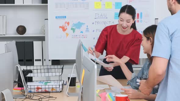 Group of asian young creative happy people casual dress entrepreneur on a presentation