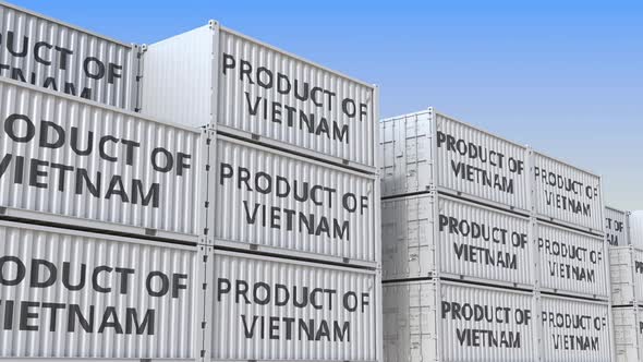 Containers with PRODUCT OF VIETNAM Text in a Container Terminal