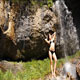 Girl In Swimsuit At The Waterfall - VideoHive Item for Sale