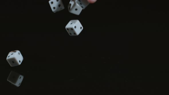Dice falling and bouncing in slow motion; shot on Phantom Flex 4K at 1000 fps alt
