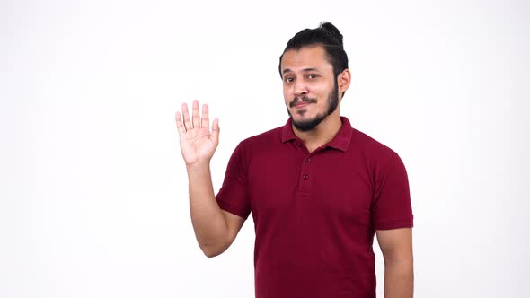 Indian man waving hand