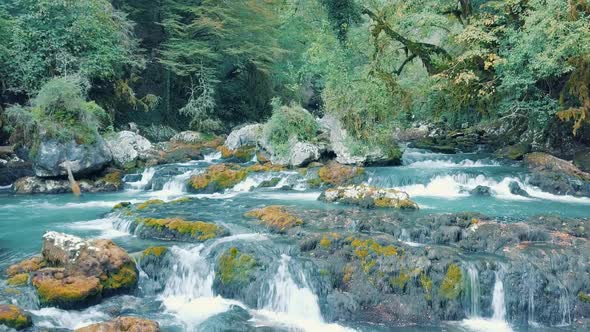 Amazing Waterfall at Autumn Forest. Shooting From a Drone