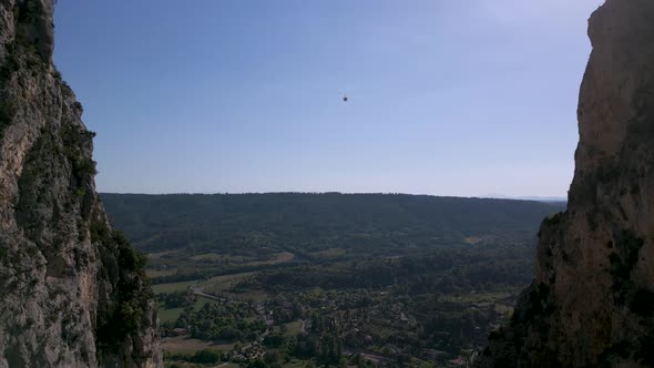 Aerial shot of a star between limestone cliffs in Moustiers-Sainte-Marie, France