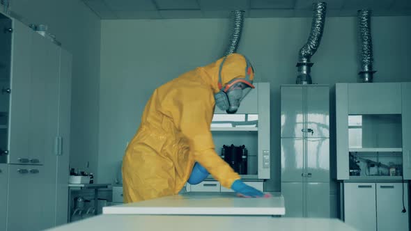 Laboratory Room with a Table Getting Sanitized By a Disinfector During COVID-19 Outbreak.