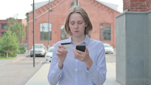 Woman Making Online Payment on Smartphone