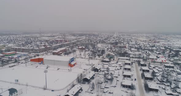 Sovetskiy city. Aerial. Winter, snow, cloudy. Khanty Mansiysk Autonomous Okrug (HMAO), Russia