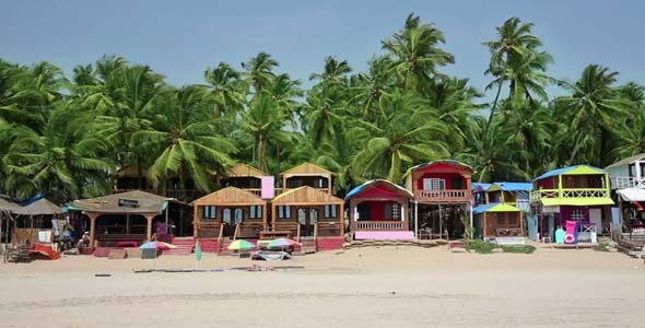 Colourful Bungalows In Resort On Sandy Beach